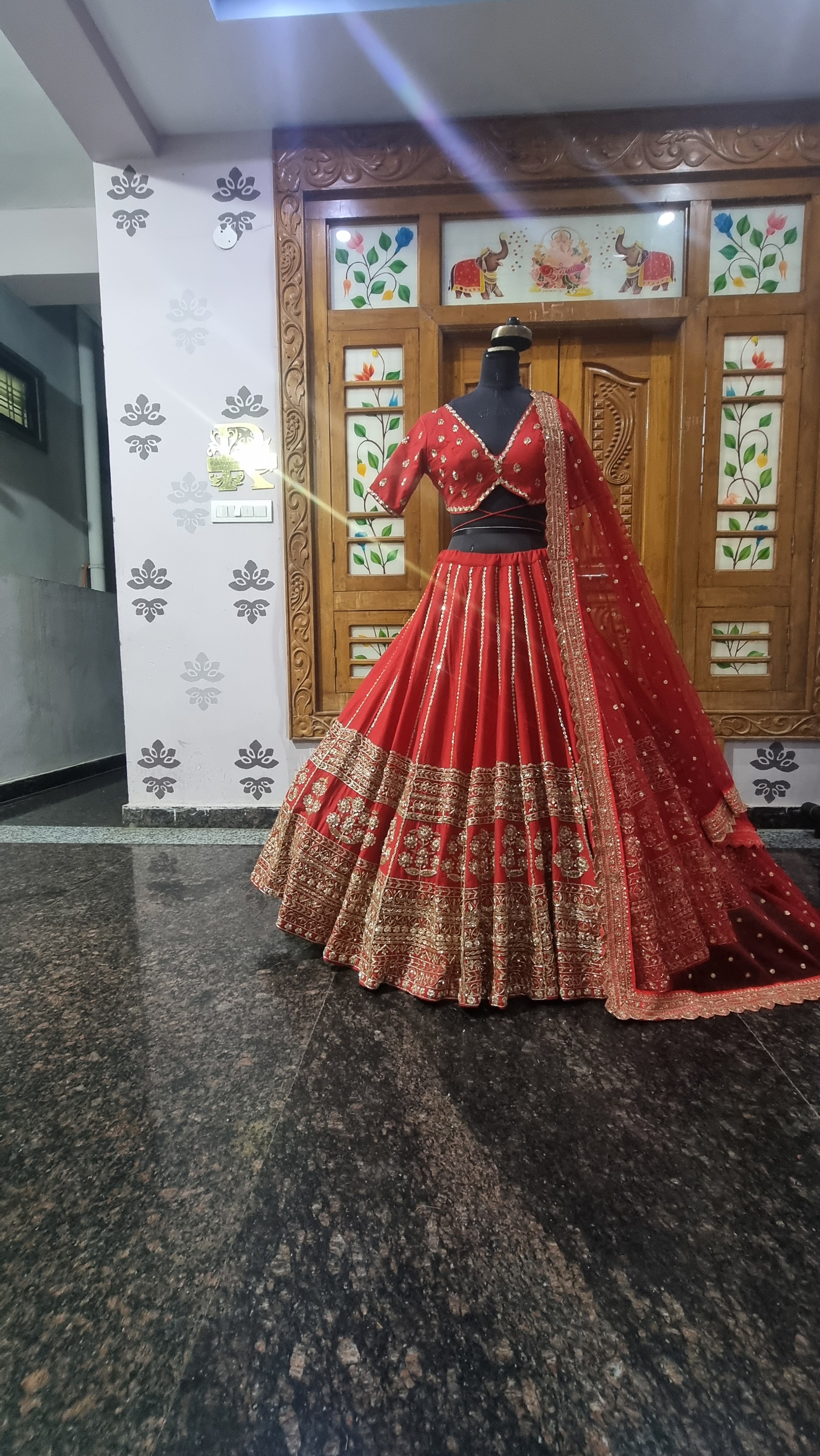 The Crimson Rajkumari – Sabyasachi Inspired Red Zardozi Bridal Lehenga