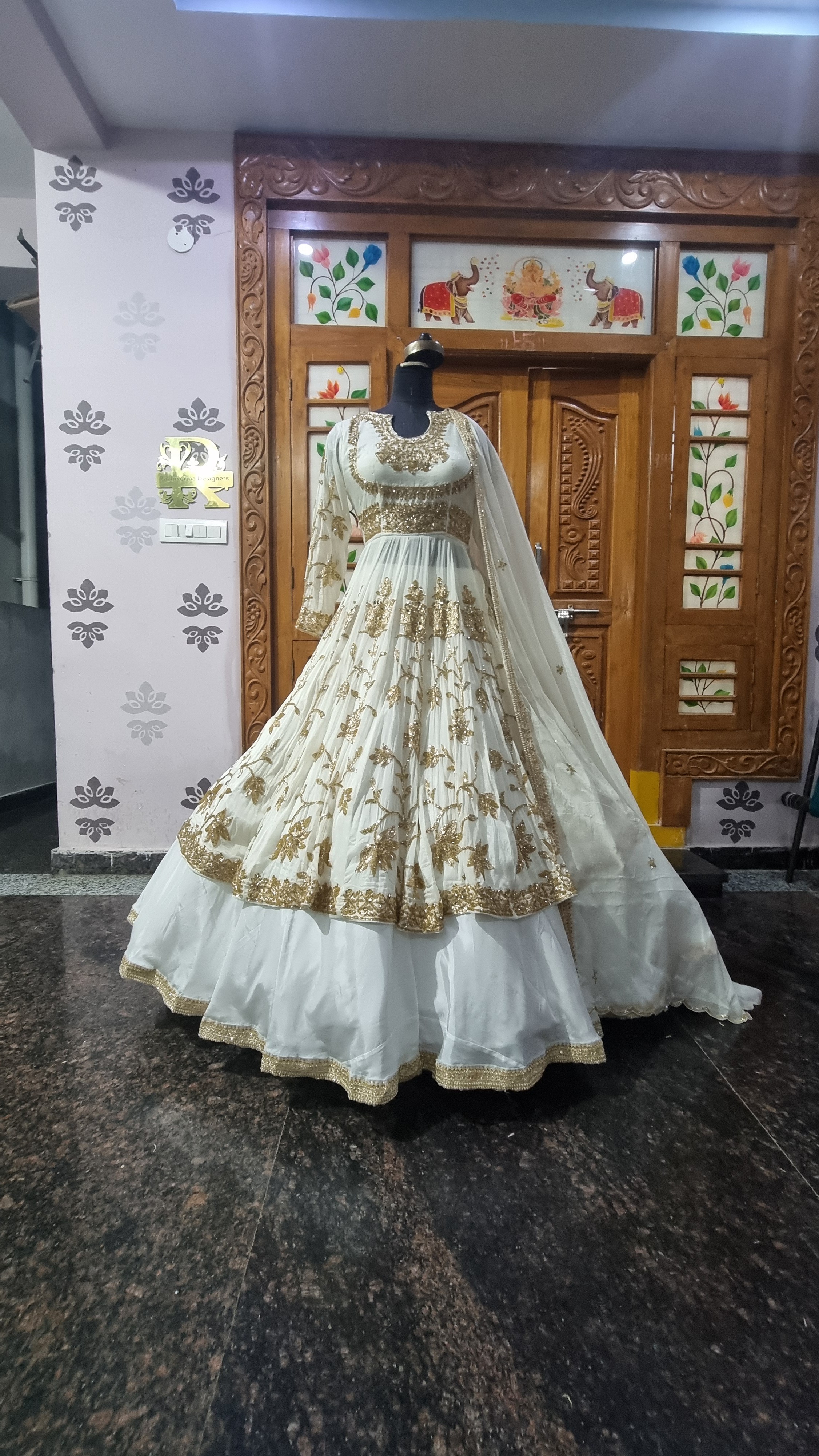 The Ivory Aura – Off-White Lehenga with Tiered Step-Layer Blouse